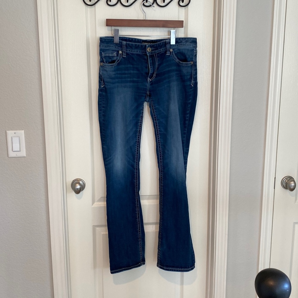 Boot cut low rise jeans by express